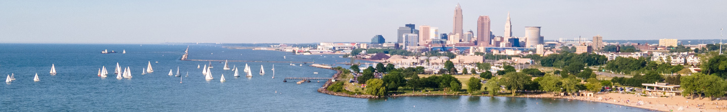 Sailboats on Lake Erie off the shore of Edgewater Park and the skyline of Cleveland, Ohio, in the background